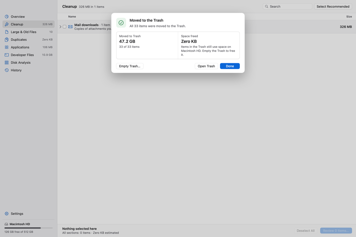 DiskJoy cleanup result sheet showing Moved to Trash (47.2 GB) and Space freed (Zero KB) as separate numbers, with Empty Trash, Open Trash and Done